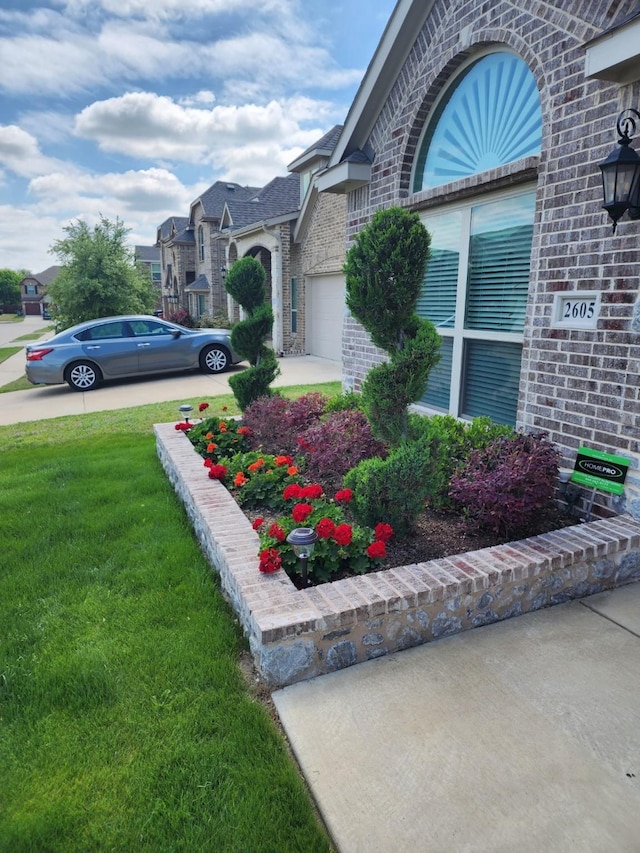 view of yard with a garage