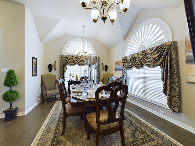 dining room featuring an inviting chandelier, vaulted ceiling, and dark hardwood / wood-style flooring