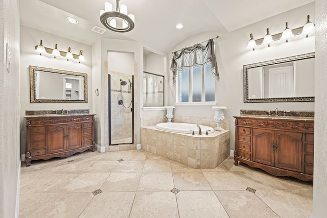 bathroom with separate shower and tub, tile patterned floors, vanity, and vaulted ceiling