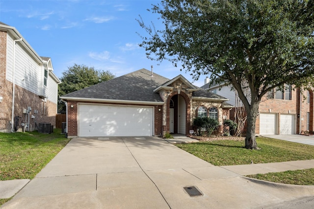 view of front facade featuring central AC unit, a garage, and a front lawn