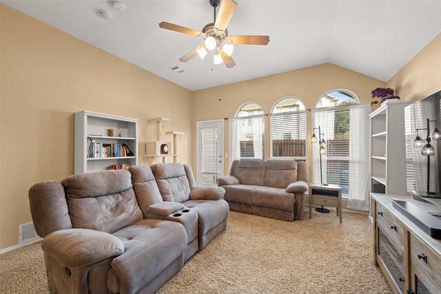 living room featuring light carpet, vaulted ceiling, and ceiling fan