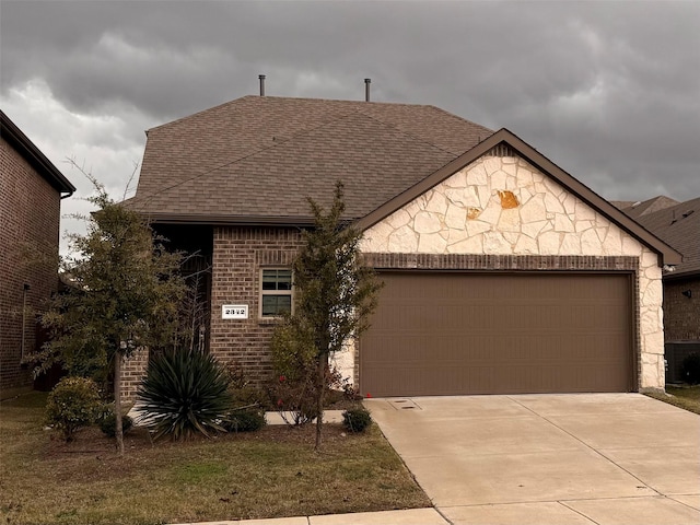 view of front of home with a garage