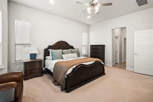 carpeted bedroom featuring ceiling fan