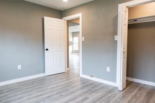 unfurnished bedroom with light hardwood / wood-style flooring