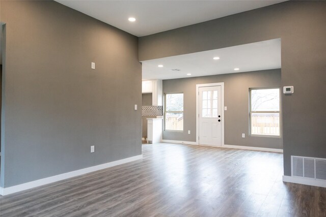 unfurnished living room with light hardwood / wood-style floors