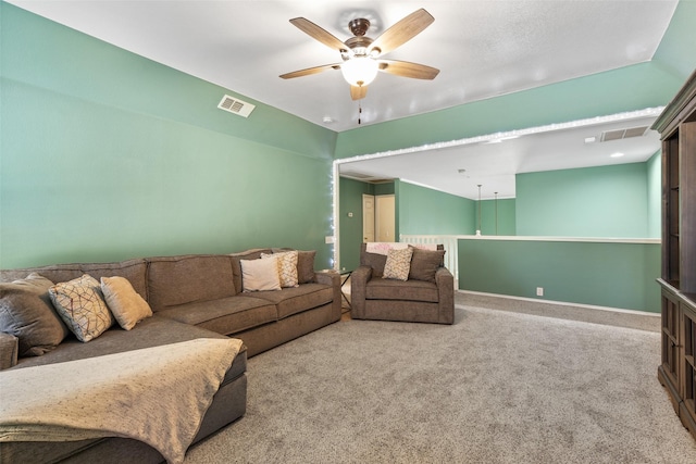 living room with carpet flooring and ceiling fan