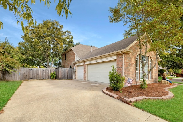 view of side of property with a garage