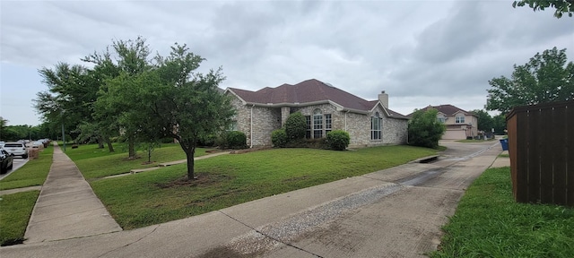 view of property exterior with a yard