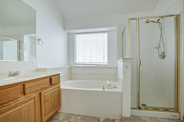 bathroom with plus walk in shower and vanity