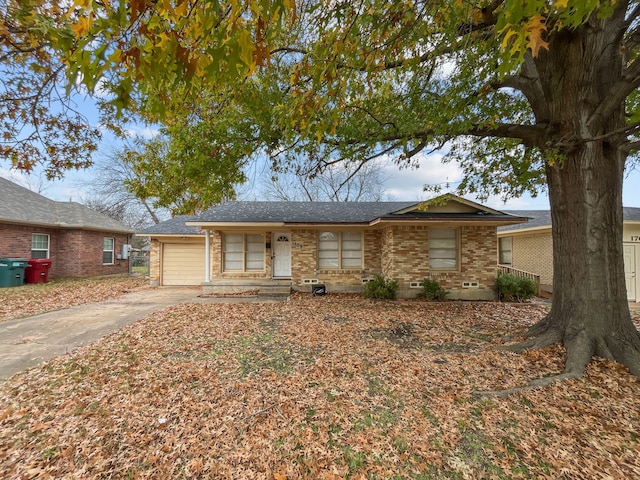 ranch-style home with a garage