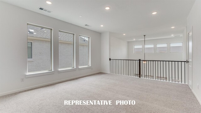 empty room featuring carpet floors