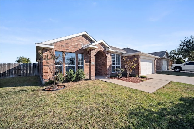 ranch-style house with a front lawn and a garage