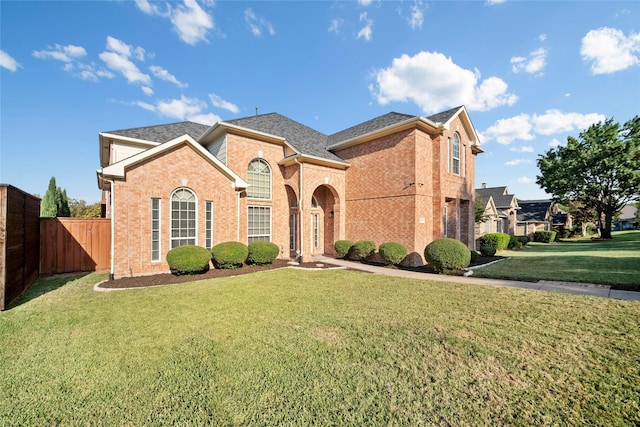 view of front of house with a front lawn