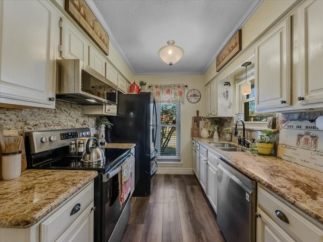 kitchen with appliances with stainless steel finishes, ornamental molding, sink, white cabinets, and hanging light fixtures