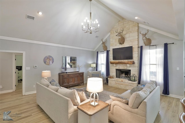 living room with beamed ceiling, a fireplace, high vaulted ceiling, and light wood-type flooring