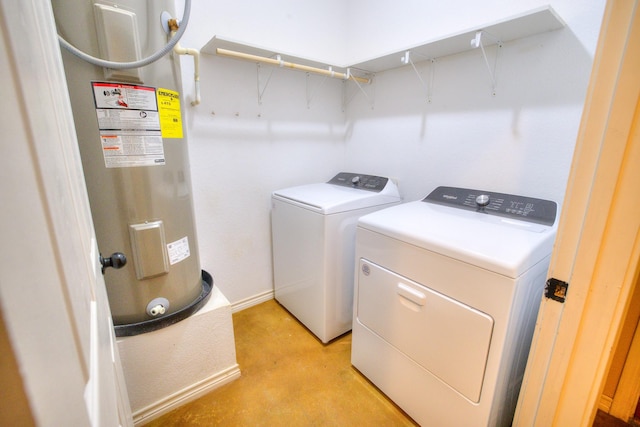 laundry room with independent washer and dryer and electric water heater