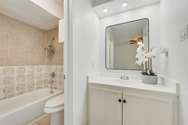 full bathroom with tile patterned floors, vanity, toilet, and tiled shower / bath