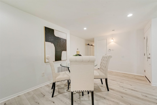 dining area featuring light hardwood / wood-style flooring