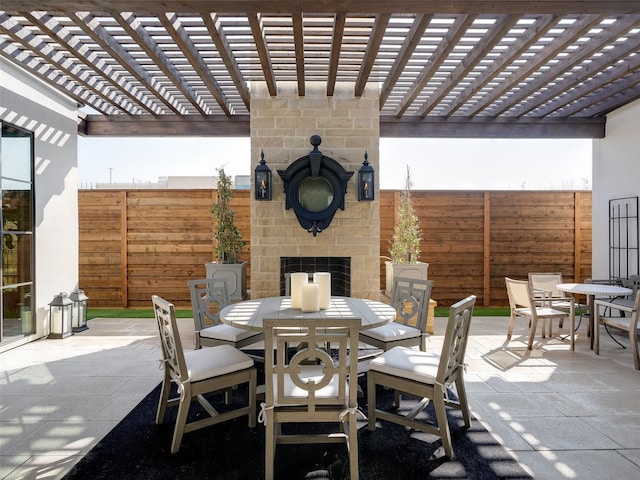 view of patio featuring an outdoor fireplace