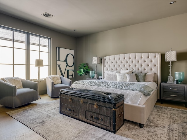 bedroom with light hardwood / wood-style floors