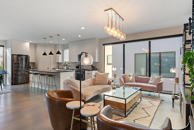 living room with light hardwood / wood-style flooring