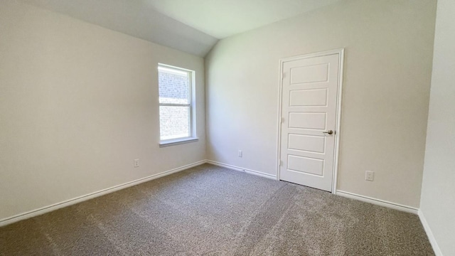 4208 Lucy Ln, Sherman, TX 75090 - carpeted empty room with baseboards and lofted ceiling