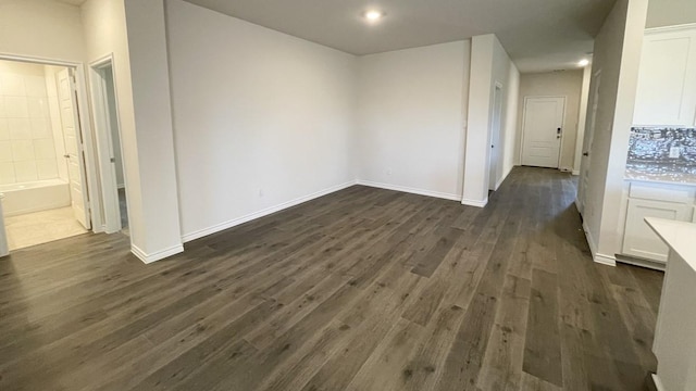 4208 Lucy Ln, Sherman, TX 75090 - spare room with dark wood-style floors, recessed lighting, and baseboards
