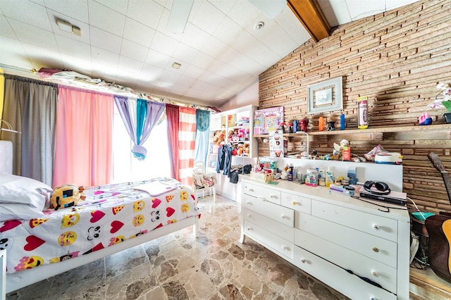 bedroom with lofted ceiling with beams