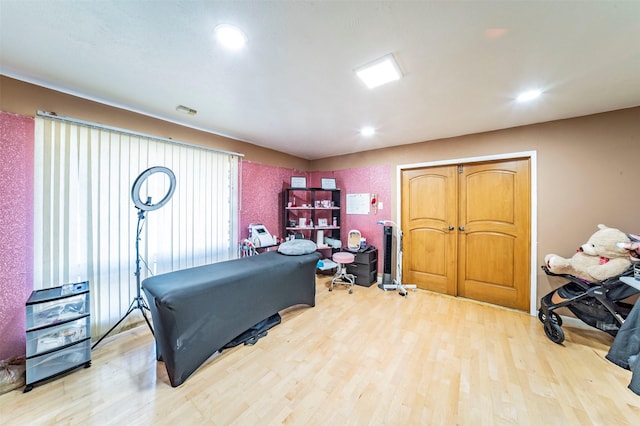 bedroom with light hardwood / wood-style floors