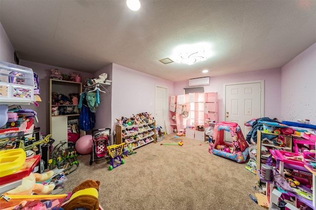 playroom with carpet floors and a wall unit AC