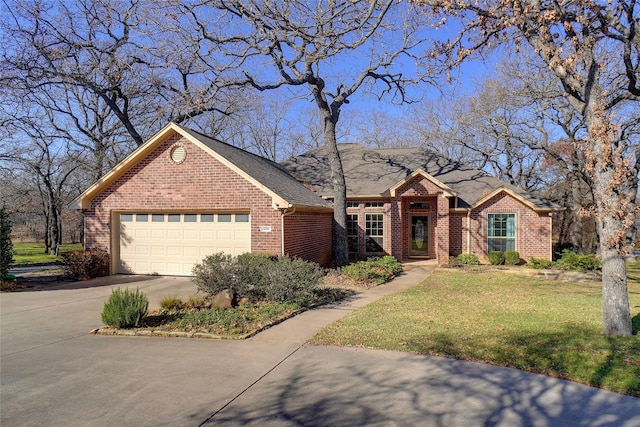 ranch-style home featuring a garage and a front lawn