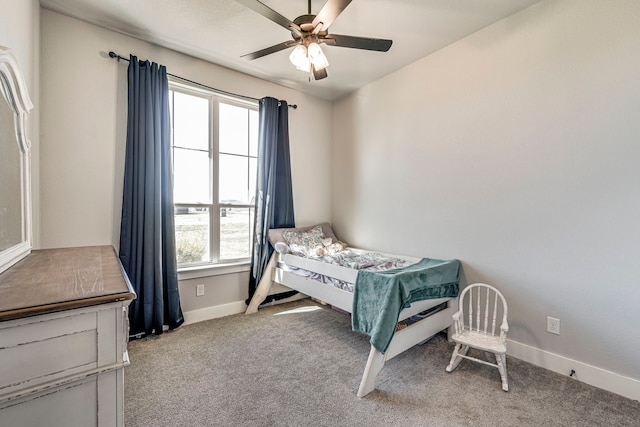 bedroom with ceiling fan and light colored carpet