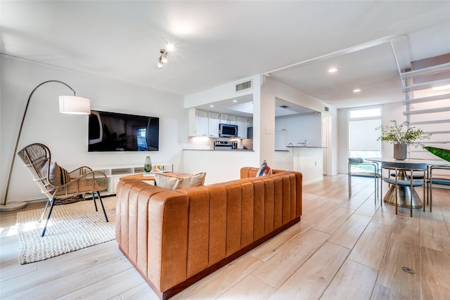 living room with light wood-type flooring