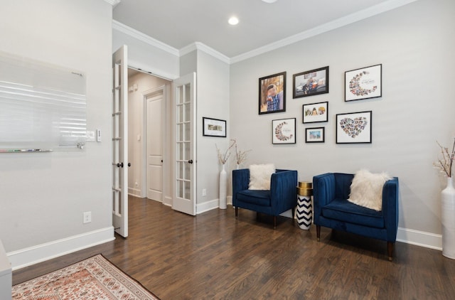 living area featuring dark hardwood / wood-style flooring, ornamental molding, and french doors