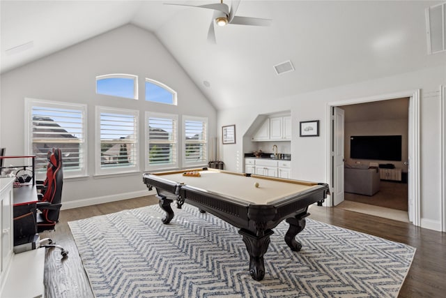 playroom featuring billiards, indoor wet bar, ceiling fan, high vaulted ceiling, and dark hardwood / wood-style flooring