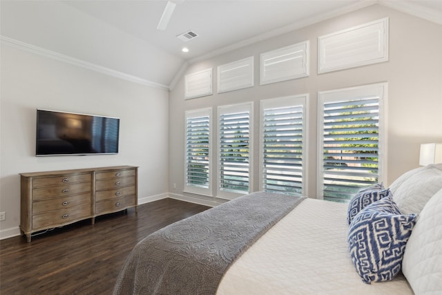 bedroom with lofted ceiling, crown molding, dark hardwood / wood-style flooring, and ceiling fan