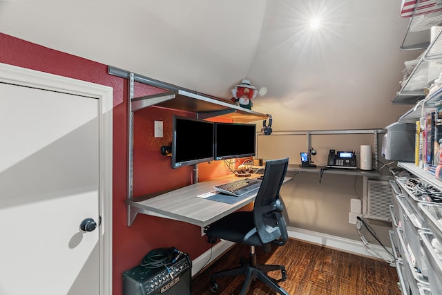 office with lofted ceiling and dark hardwood / wood-style floors