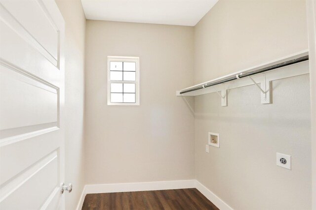 laundry area with dark hardwood / wood-style floors, hookup for a washing machine, and electric dryer hookup