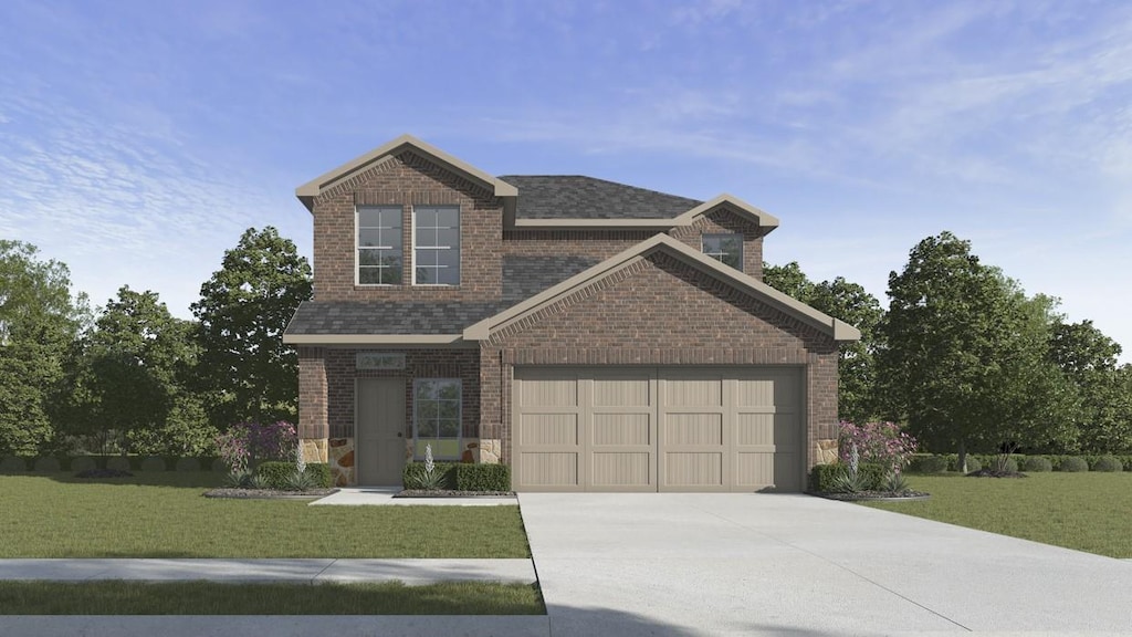 view of front of house with a garage and a front lawn