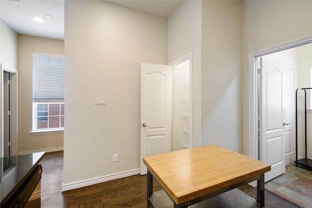 dining room with dark wood-type flooring