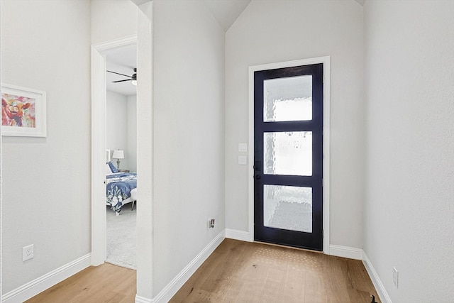 entryway featuring ceiling fan and light hardwood / wood-style floors