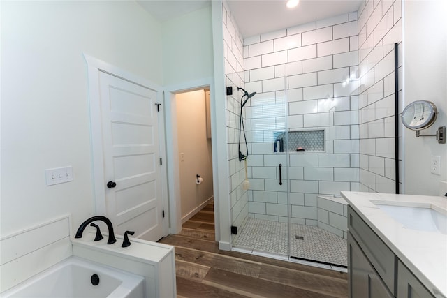 bathroom with plus walk in shower and vanity