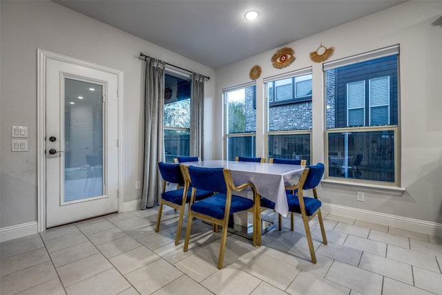 dining room with light tile patterned floors