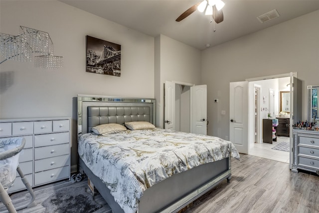 bedroom with hardwood / wood-style flooring and ceiling fan