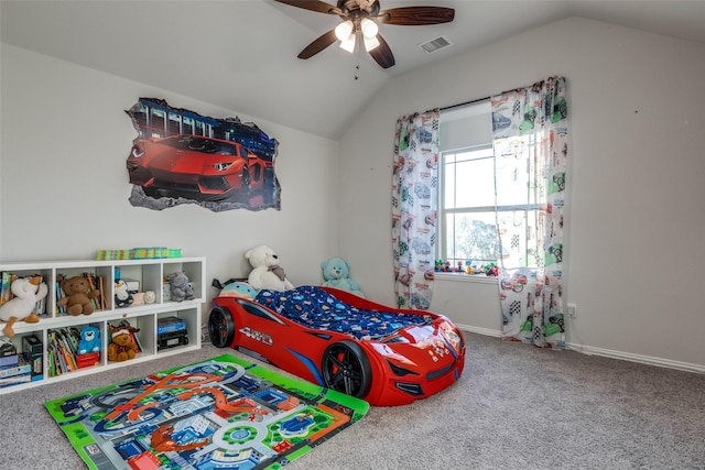 carpeted bedroom with ceiling fan and lofted ceiling