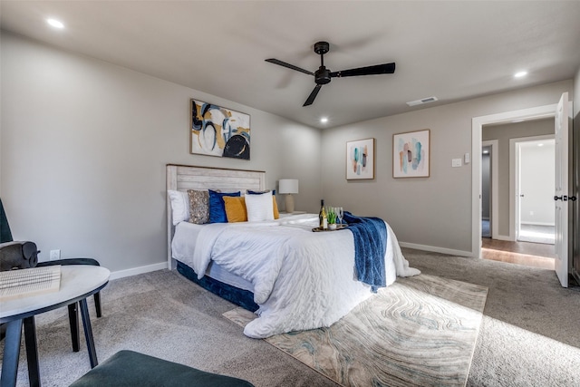 carpeted bedroom featuring ceiling fan