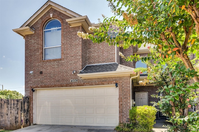 view of front of property featuring a garage