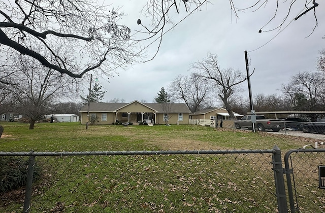 single story home with a front yard