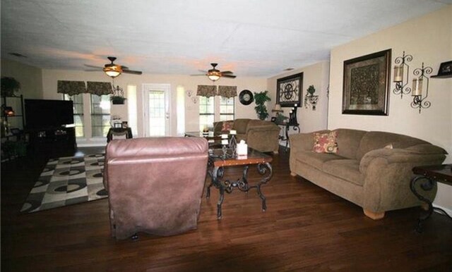 kitchen featuring a textured ceiling, ceiling fan, and white range