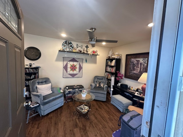 interior space with ceiling fan and dark hardwood / wood-style floors